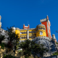 Pena Palace in colorful glory, seen from down the hill. Images of the Pena Palace, interior and exterior