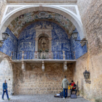 The entry gate, with an upper tier of beautiful tile, looking like a beautiful chapel. (A vertical panorama)